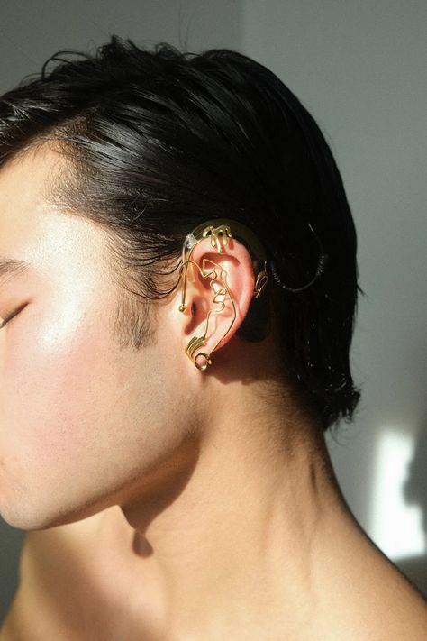 Private Policy’s Jewelry Collaboration Celebrates the Deaf and Hard of Hearing Communities | Vogue Chella Man, Cochlear Implants, Cochlear Implant, One Small Step, Hearing Loss, Hearing Aids, Ear Jewelry, Gold Plated Jewelry, Jewelry Plate