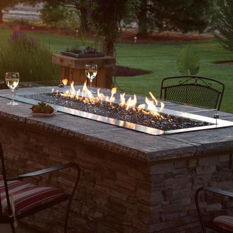 White Mountain Hearth By Empire Carol Rose 60-Inch Natural Gas Outdoor Linear Fire Pit Kit W/ Manual Electronic Ignition - OL48TP10N. OL60TP10N. Natural Gas & Propane Fire Pit Kits. Create an instant roaring fire to bring light and beauty to captivate your guests with this Carol Rose 60-inch Linear Fire Pit from White Mountain Hearth. The 65,000 BTU natural gas burner pan is built to withstand years of exposure to harsh environments with all visible elements constructed of 11-gauge marine-grade Diy Propane Fire Pit, Outside Fireplace, Natural Gas Fire Pit, Fire Pit Kit, Propane Fire Pit, Fire Features, Gas Fire, Crushed Glass, Fire Glass