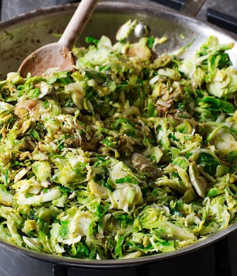 Ina Garten's beginner-level sautéed shredded Brussels sprouts recipe serves four to six and takes less than 10 minutes to make. Ina Garten Brussel Sprouts, Brussel Sprout Shredded Recipes, Shredded Brussel Sprouts Recipes, Ina Garten Vegetable Recipes, Brussels Sprouts Sauteed, Shredded Brussel Sprout Recipes Salad, Brussel Sprout Salad Shredded, Shredded Brussel Sprout Recipes Sauteed, Brussels Sprouts Salad Shredded