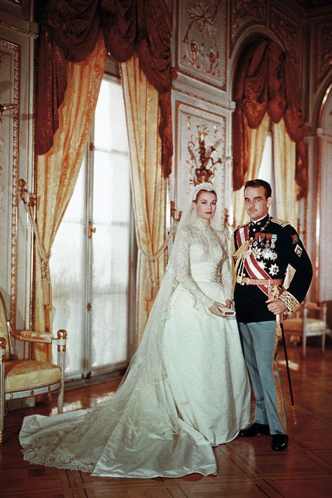 Grace Kelly and Prince Rainier of Monaco in 1956. Kelly wore a gown by MGM costumer Helen Rose, who had dressed her for her films High Society and The Swan.   - MarieClaire.com Grace Kelly Wedding Dress, Klasik Hollywood, Grace Kelly Wedding, Famous Wedding Dresses, Expensive Wedding Dress, Helen Rose, Royal Wedding Gowns, Princess Grace Kelly, Iconic Weddings