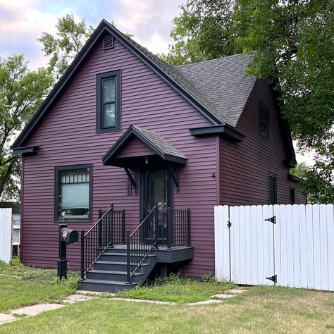 Prism Bordeaux metal siding from EDCO Products. Dark home exteriors are hugely popular in 2022! What do you think of this look? Find more siding inspiration for your home at edcoproducts.com. Plum Siding House, House Outdoor Paint Ideas, Gothic Exterior House Colors, Simple House Paint Exterior, Purple And Black House Exterior, House Color Inspo Exterior, Purple Color House Exterior, Purple Siding Exterior, Purple Trim House Exterior