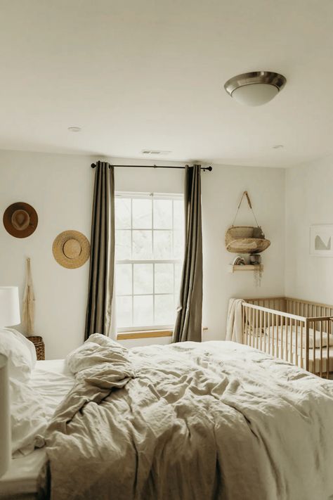 Turn a corner of your bedroom into a mini nursery with a cozy crib, soft rugs, and essential storage solutions. Create a calming space for your baby in your one-bedroom apartment by adding cute wall decals and a small rocking chair for those late-night feedings. Read this article for more tips and tricks! Nursery Guest Room Combo, Apartment Nursery, Nursery Nook, Nursery Guest Room, Baby Corner, Parents Room, Bedroom Updates, Master Room, Shared Room