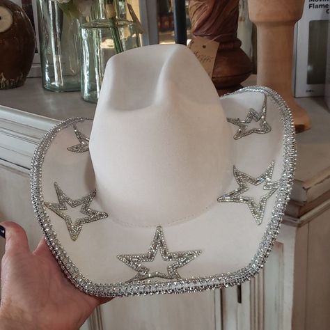 This Is A Beautiful Vibrant White Hat. Its The Hat With Lots Of Rhinestones. It Has Rhinestone Stars On It As Well. Even The Underside Is Full Of Rhinestones. What A Statement Piece. Bling Bling! Bejeweled Cowboy Hat Taylor Swift, White Bedazzled Cowboy Hat, Badazzel Cowboy Hat, Silver Cowgirl Hat, Senior Hats, Decorate Cowboy Hat, Cowgirl Hat Diy, Bedazzled Cowboy Hat, Decorated Cowboy Hats