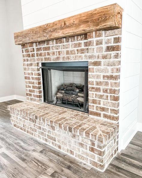 Bricked In Fireplace, Orange Brick Fireplace Makeover, Fireplace Ideas With Bookshelves, Cypress Fireplace Mantle, Brick Fireplace Modern Farmhouse, Stone Fireplace Inspiration, Fireplace Open On Both Sides, White Grout Fireplace, Modern Farmhouse Brick Fireplace