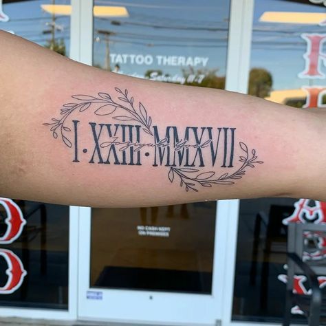 Name Tattoo On Bicep, Family Last Name Tattoos, Middle Name Tattoos, Mom Name Tattoos, Child Name Tattoo Ideas For Men, Name On Arm Tattoo, 1985 Tattoo, Grandmother Tattoo Ideas, Tattoos For Son