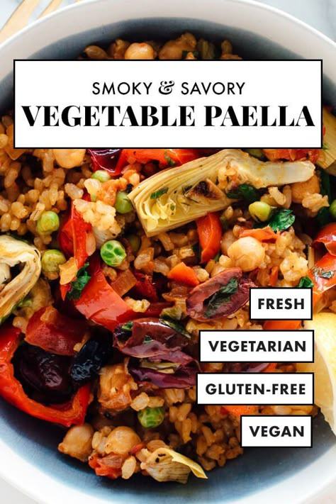 The BEST vegetable paella recipe! It’s loaded with vegetables, chickpeas, and savory spiced rice. This paella recipe is absolutely delicious and easy to make at home, too. It’s vegetarian, vegan and gluten free! #cookieandkate #paella #vegan #healthyrecipe #dinner Baked Risotto Recipes, Vegetable Paella Recipe, Paella Recept, Vegetable Paella, Spiced Rice, Paella Recipe, Vegetarian Cookbook, Spanish Dishes, Vegan And Gluten Free