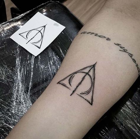 47 Cool and Magical Harry Potter Inspired Tattoos - StayGlam Felix Felicis Tattoo, Expecto Patronum Tattoo, Harry Tattoos, Harry Potter Symbols, Diy Tattoo Permanent, Tatuagem Masculina Pequena, Deathly Hallows Symbol, Armband Tattoos, Petit Tattoo