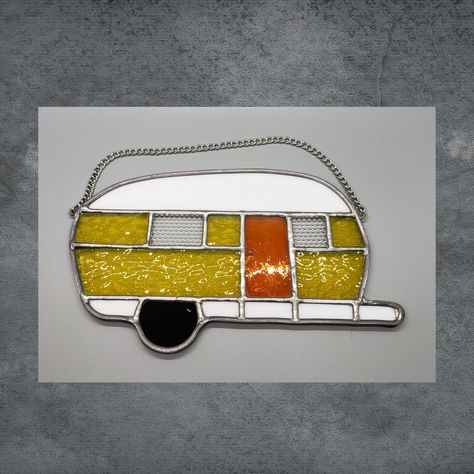 "Are you a camping enthusiast? Is someone you know hooked on camping?  This yellow stained glass camper with a bright orange door will bring a smile to your face as you enjoy past summer memories.  It will certainly be the basis of conversation when you hang one in your camper window while in the campground (remove from window for travel) and in the off-season hang in your window at home, reminding you of the fun times to come when it's camping time again! Yellow not your color?  Check our other Camper Windows, Orange Door, Stained Glass Patterns Free, Triangle Art, Yellow Doors, Flower Panels, Camping Lovers, Camper Decor, Air Plant Holder