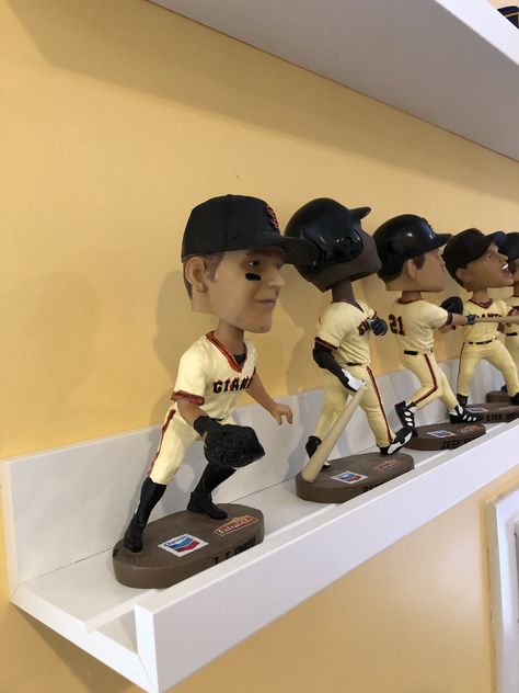 IKEA Mosslanda is perfect to display bobble heads in a man cave. Bobble Head Display Ideas, Bobblehead Display Ideas, Sports Memorabilia Display Wall, Memorabilia Display Ideas, Bobblehead Display, Sports Memorabilia Room, Ikea Mosslanda, Sports Cave, Sports Memorabilia Display