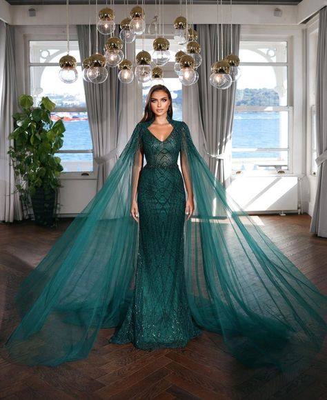 Fashion outfits/party wear dresses/ designer dresses/green dresses/ prom dresses/ evening gowns Gown With Cape, Tulle Cape, Outfits Wedding, Cape Gown, Evening Dresses With Sleeves, Full Length Gowns, Cape Sleeves, Beaded Gown, Cape Dress