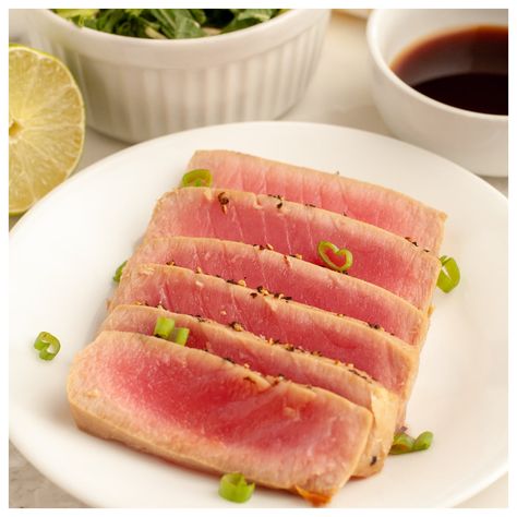 Sliced tuna on a plate. Cooking Ahi Tuna, Pan Seared Tuna Steak, Fresh Tuna Recipes, Ahi Tuna Steak Recipe, Wasabi Mayo, Grilled Tuna Steaks, Ahi Tuna Steak, Tuna Steak Recipes, Raw Tuna