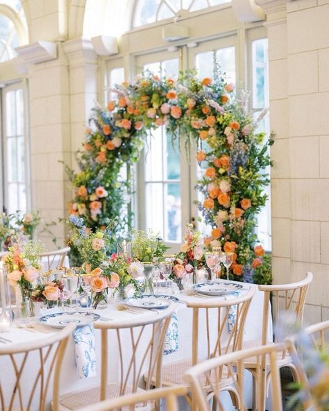 A tablescape that’s all about elegance, charm and color! The perfect blend of vibrant florals, delicate blue china and soft candlelight makes this setting a dream come true for a couple who values attention to detail. Every element is carefully curated to create an atmosphere of timeless luxury and romance. At Alinato Events, we believe your wedding should be a true reflection of your style, and this tablescape captures that essence beautifully. #weddingtablescape #weddingtable #weddingre... Bridgerton Event, Colorful Wedding Decor, Vibrant Florals, Wedding Planning Services, Coffeehouse, Timeless Luxury, Colorful Wedding, Wedding Event Planner, Wedding Tablescapes