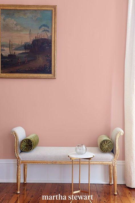 This perfect pink paint color is an updated take on the Millennial pink shade that you can use in any room of your home. This muted pink shade looks like the inside of a seashell and is considered a neutral pink paint color that will add some warmth and charm to your space. #paintcolors #marthastewart #paintideas #paintcolorideas #bestpaintcolors #homeinspiration Neutral Pink Wall Color, Muted Pink Bedroom, Neutral Pink Bedroom, Mcm Bedroom, Indoor Paint Colors, Pink Painted Walls, Timeless Paint Colors, Pink Bedroom Walls, Bedroom Colours