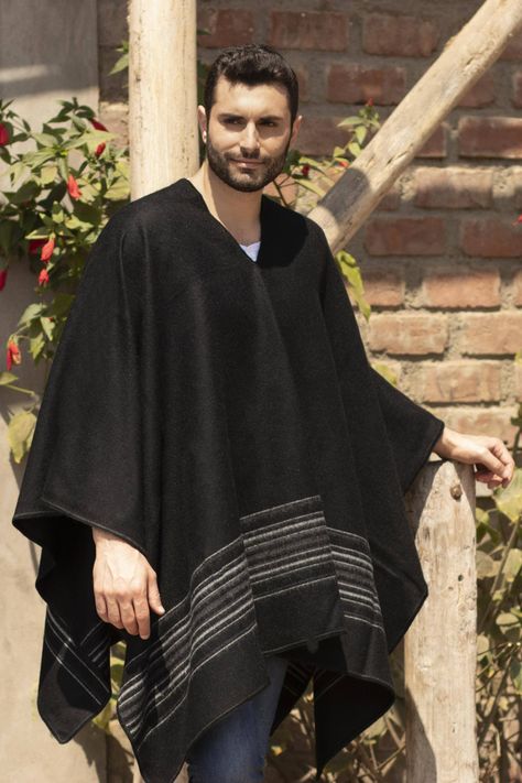 In black this handsome poncho for men is detailed with horizontal grey lines near the bottom. Celinda Jaco weaves the poncho with a soft alpaca blend and finishes it by hand. Once reserved for the Inca aristocracy and later for special occasions alpaca is coveted for its warmth. Poncho For Men, Boho Men Style, Clothing Drawing, Poncho Fashion, Poncho Men, Mens Poncho, Alpaca Poncho, Peruvian Textiles, Crochet Hoodie