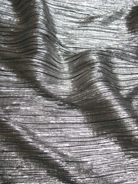 FH-16-O Polyester Silver Metallic Foil Pleated Design  57/58" Wide Fabric Content:  100% Polyester Mechanical Stretch  Country/Region of Manufacture: Korea Color: Black Background/Silver Foil Metallic Print Design, Chrom Aesthetic, Silver Fabric Texture, Pewter Aesthetic, Metallic Moodboard, Metallic Silver Aesthetic, Silver Astethic, Metallic Fabric Texture, Metallic Aesthetic