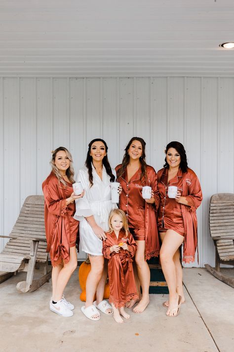 "🌹NEW XS SIZES and KIDS SIZES are available here in matching colors:  https://www.etsy.com/listing/1565054669/  🌹Luxury satin bridesmaid pajamas set for getting your wedding party ready, bachelorette party, birthday party or girl's getaway. 🌹We offer 2 styles: SHORT sets (short sleeve's top and shorts), and LONG sets (long sleeve's top and pants). 🌹Please note: Very Peri pajamas available with short set only. 🌹Two pockets on the bottom of the shirt. 🌹Arrives beautifully packaged in an organza gift bag. 🌹WE WILL PROCESS YOUR ORDER ASAP AND SHIP VIA PRIORITY USPS MAIL. 🌹SIZES (Pajamas runs large for more comfortable fit): 🌹SIZING in inches for SHORT PAJAMAS (short sleeves & shorts) : XSMALL: SHOULDER 15 /BUST 35 /LENGHT OF TOP 24,5 /WAIST (HIPS) 35 /LENGHT OF SHORTS 12.6 / US Dress Orange Pjs, Pajamas Wedding Party, Burnt Orange Bridesmaid, Bridal Party Pajamas, Long Pajamas, Bridesmaid Pajamas, Western Themed Wedding, Bridesmaid Pajama Set, Orange Bridesmaid