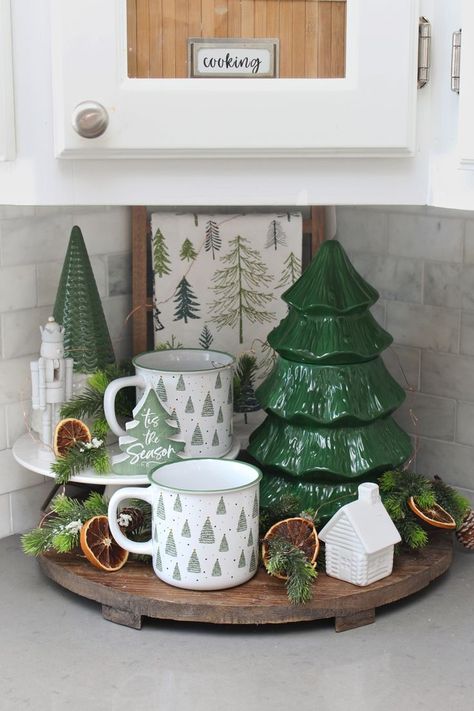 Dec 6, 2022 - Add some pretty kitchen Christmas decor to your home with these simple seasonal touches. Tour around this green and white Christmas kitchen to get inspired! Seasonal Kitchen Decor, Rustic Kitchen Christmas Decor, Christmas Mug Display Ideas, Christmas Cafe Decor Ideas, Pine Tree Christmas Decor, Christmas Decor Tray, Christmas Tray Decor Ideas, Green And White Christmas Decor, Kitchen Christmas Decorations