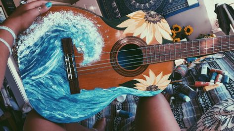 Painted old guitar waves and sunflowers acrylic paint DIY. Things / ideas to do with an old guitar Ukelele Decoration Ideas, Painting A Guitar Diy, Painting On A Guitar, Painted Ukelele Ideas, Painted Guitars Ideas, Painting On Guitar Ideas, Ukulele Painting Ideas, Painting On Guitar, Guitar Painting Ideas