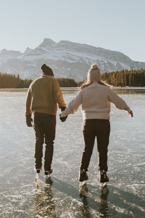 Ice skating couples session on frozen Two Jack Lake in the Rockies! We were lucky to have this place to ourselves on a Sunday morning. Ice Skating On Frozen Lake, Couple Skating Aesthetic, Couples Ice Skating Photoshoot, Skating Couple Pictures, Ice Skating Couple Aesthetic, Ice Skating Couple Pics, Couple Ice Skating Aesthetic, Ice Skating Aesthetic Couple, Ice Skating With Boyfriend