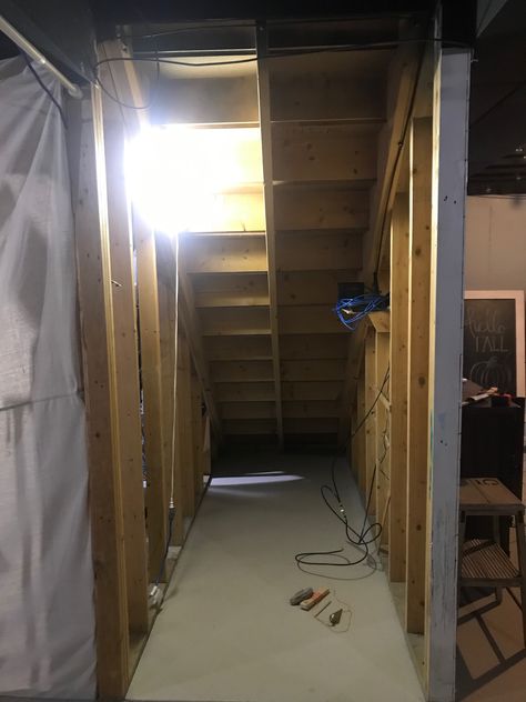 See how this space under the stairs is completely transformed into a darling playhouse. Understairs Playhouse Diy, Finish Under Stairs, Play Space Under Stairs, Understairs Kids Space, Secret Room Under Stairs, Under Stairs Ideas For Kids, Basement Under Stairs Ideas, Under Stairs Kids Space, Under The Stairs Kids Space