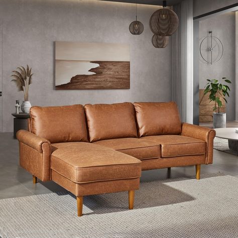 PRICES MAY VARY. Elegant Design: Weaxty Convertible Sectional Sofa features a beautiful design that brings a touch of refinement to any indoor space. Whether it is placed in the living room, study, lounge, or office, this sofa elevates the overall ambiance with its exquisite appearance and stylish charm Spacious & Comfortable: Weaxty Sectional Sofa is crafted with premium suede fabric and high-density foam, providing a comfortable seating experience that remains fatigue-free even after extended Mid Century Sectional Sofa, Couch Sofas, L Shaped Living Room, Mid Century Sectional, Mid Century Modern Sectional Sofa, Couches For Small Spaces, Faux Leather Sectional, Living Room Apartment, Space Living Room