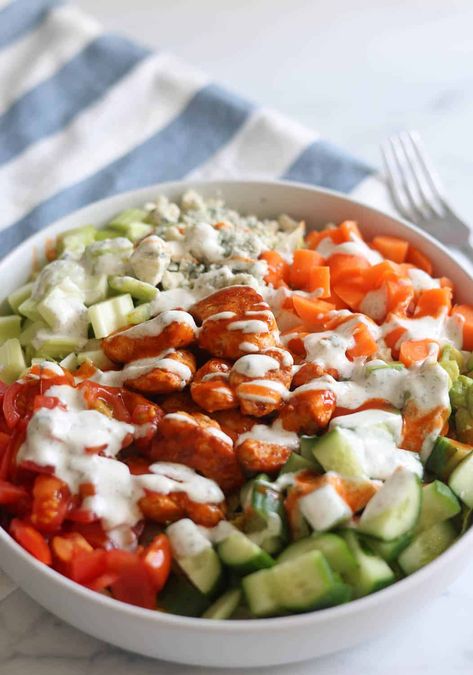 This homemade chopped buffalo chicken salad recipe is made with crisp, fresh vegetables, bite-size pieces of buffalo chicken, creamy avocado, tangy blue cheese, and a homemade ranch dressing.  You can get all the flavors of this favorite restaurant salad right at home! Chopped Buffalo Chicken Salad, Buffalo Chicken Salad Meal Prep, Buffalo Chicken Chopped Salad, Chicken Chopped Salad Recipes, Buffalo Chicken Salad Recipe, Buffalo Chicken Breast, Restaurant Salad, Chopped Salads, Buffalo Ranch Chicken