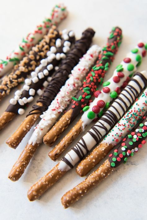 Christmas Chocolate Covered Pretzels, Chocolate Covered Pretzels Christmas, Covered Pretzel Rods, Christmas Pretzels, Dipped Pretzels, Chocolate Covered Pretzel, Chocolate Covered Pretzel Rods, Chocolate Dipped Pretzels, Twine Bow