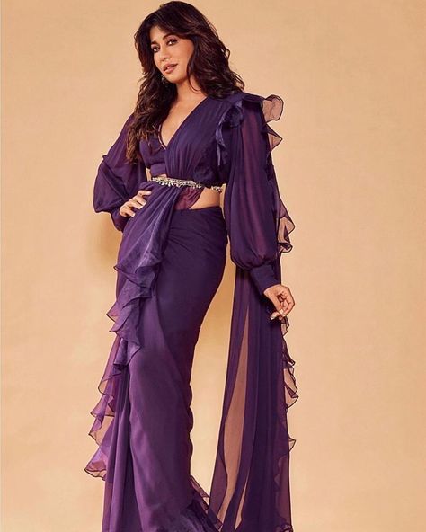 Aashni + Co on Instagram: “Layer up the drama with ruffles and statement sleeves for the next wedding on your calendar. Shop on aashniandco.com // Email…” Bollywood Style Purple Pre-draped Saree For Wedding, Fitted Georgette Pre-draped Saree For Celebration, Fitted Floor-length Pre-draped Saree For Celebrations, Fitted Organza Pre-draped Saree For Celebration, Purple Wedding Blouse Piece, Elegant Georgette Gown For Celebration, Purple Semi-stitched Pre-draped Saree For Wedding, Elegant Gown For Diwali Celebration, Fitted Georgette Gown For Celebration