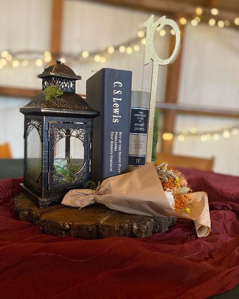 Lanterns And Books Centerpieces, Book And Lantern Centerpieces, Book Wedding Centerpieces, Book Centerpieces, Books Flowers, Wood Centerpieces, Book Tree, Lantern Centerpieces, 50th Anniversary Party