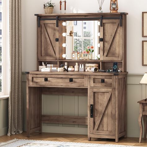 PRICES MAY VARY. [Farmhouse Style] This vanity desk stands out because of its rich farmhouse style. With a perfect blend of distressed white finishes, z-brace barn door trim, and exposed metal hardware, the makeup vanity desk is not only robust and sturdy, but it also has farmhouse charm and adds a relaxed, earthy aesthetic to the room. The unique sliding door design on the upper part can be used to hide the shelves/lighted mirror, both exquisite and practical [Powerful Storage Space] Overall si Wooden Vanity Desk, Western Vanity, Rich Farmhouse, Rustic Makeup Vanity, Vanity Table With Drawers, Bedroom Vanity Ideas, Vanity Desk With Mirror, Desk With Mirror, Farmhouse Vanity