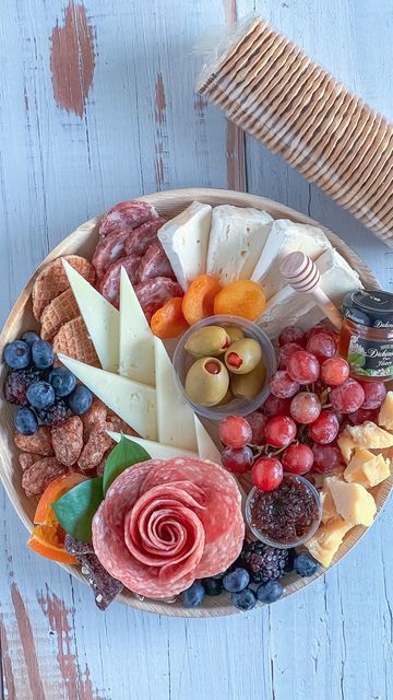 Kim | Charcuterie & Things LLC on Instagram: "Sometimes small and simple is all you need. . . . . . . . #charcuterie #longislandfood #cheeseboards #foodphotography #nassaucountyny #cheeseboardsofinstagram #foodporn #yummy #delicious #instafood #cheeseandwine #charcuterieboard #cheeselover #grazing #catering #foodie #foodstagram #food #longisland #thefeedfeed #buzzfeedtasty #foodnetworkkitchen" Charcuterie Small Board, Cheese Platter Small, Grazing Platter Small, Small Chacuretie Board, Small Party Catering Ideas, Simple Grazing Board, Cachutery Board Ideas Small, Small Charcuterie Boards Ideas, Charcuterie Board Simple Small