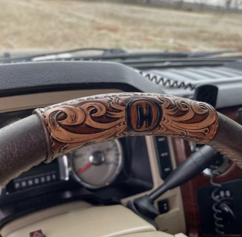 Punchy Truck Accessories, Tooled Leather Steering Wheel Cover, Tooled Leather Projects, Western Truck Accessories, Truck Interior Ideas, Western Car Accessories, Truck Interior Accessories, Custom Steering Wheel, Best Car Interior