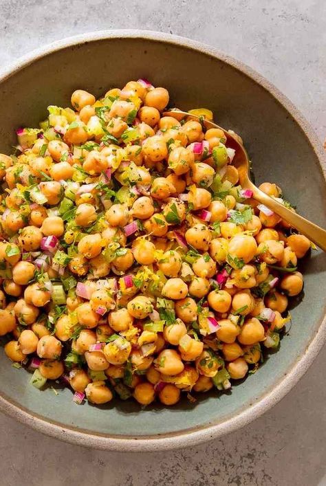 Tom Colicchio's chickpea salad is a stellar recipe for a picnic or potluck. It's perfect with warm, soft pita to soak up the lemony olive oil dressing. Cold Chickpea Salad, Chickpea Salad With Olives, Warm Chickpea Salad, Hosting Dishes, Chickpea Salad Lunch, Spiced Chickpea Salad, Spicy Chickpea Salad, Power Salads, Salad Dressing Recipes Vinaigrette