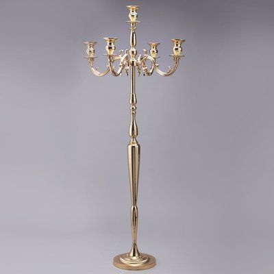 This tabletop candelabra features five candle arms that exude elegance and refinement. The fluted top is perfect for displaying taper candles or small floral bouquets. Color: Gold | House of Hampton Tall Metal Candelabra Metal in Yellow, Size 60.5 H x 25.0 W x 25.0 D in | Wayfair Floor Candelabra, Gold Candelabra, Gold House, Glass Candelabra, Metal Candelabra, Food Tech, Metal Floor, Candle Wall Sconces, Design Toscano