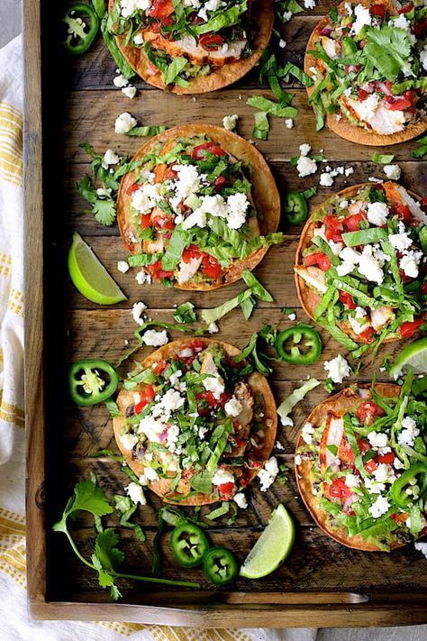 Chicken Tostadas with Black Bean Guacamole and Salsa Fresca are perfect for a fun dinner or festive addition to your Cinco de Mayo party!  They're piled high with guacamole, marinated grilled chicken, fresh salsa, lettuce and queso fresco cheese. #chicken #chickentostadas #blackbean #guacamole #salsa #Mexicanfood #CincodeMayo #ProgressiveEats Fancy Vegetarian Dinner, Fresco Cheese, Queso Fresco Cheese, Tostada Recipes, Chicken Tostadas, Chicken Fresh, Fun Dinner, Salsa Fresca, Tex Mex Recipes