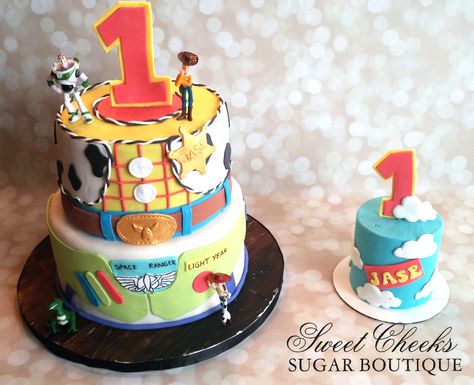 A toy story themed cake and matching smash cake for an adorable one year old. Happy Birthday Jase!! Birthday Party Themes For Men, Toy Story Smash Cake, Party Themes For Men, Toy Story Birthday Cake, Toy Story Party Decorations, Toy Story Theme, Toy Story Cakes, Toy Story Birthday Party, First Birthday Themes