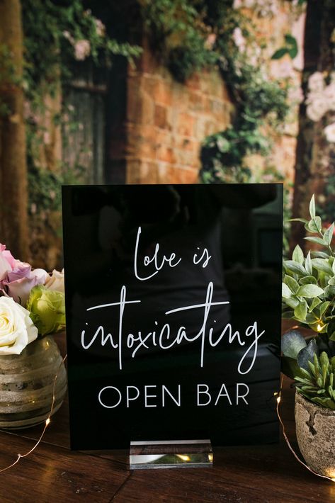 Dark And Moody Engagement Party, Love Is Intoxicating Sign, Acrylic Wedding Drink Sign, Funny Wedding Centerpieces, Mr And Mrs Table Sign, Modern Wedding Decor Black And White, Wedding Decorations Signs, Black Simple Wedding Decor, Peach And Black Wedding Theme