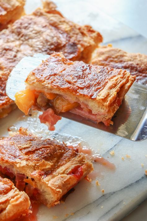 Peach & Rhubarb Slab Pie - Lepp Farm Market Peach Rhubarb Pie, Rhubarb Slab Pie, Peach Rhubarb, Slab Pies, Rhubarb Desserts, Peach Recipes, Slab Pie, Baking 101, Rhubarb Pie