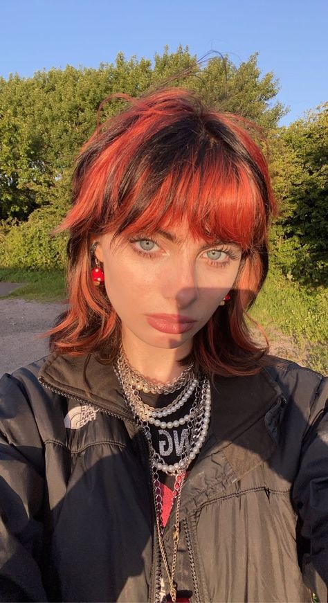 Red Orange Shag Hair, Red And Black Hair Short Alt, Red And Orange Streaks Hair, Alt Short Hairstyles With Bangs, Black And Red Fluffy Hair, Red Bleached Hair, Alt Hair Inspo Short, Black And Red Shag Hair, Short Red Black Hair