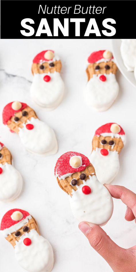 Santa Nutter Butter Cookies are the perfect addition to your Christmas cookie exchange. Peanut nut nutter butter cookies are dipped in chocolate and made to look like Santa! It's a cute treat the kids love! Santa Desserts, Santa Cookie Recipe, Festive Cookie Recipes, Christmas Cookies Kids, Santa Snacks, Best Christmas Recipes, Nutter Butter Cookies, Dipped Cookies, Festive Cookies