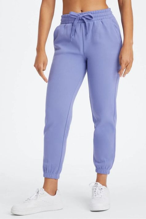 Sometimes you just need a pair of laidback sweatpants—and this is that pair! Lounge, work out, or run errands in our super soft, slightly oversized sweats with side pockets and an adjustable drawcord. #Fabletics #LoungeWear #Sweatpants Female Activewear, Winter Fits, Wardrobe Basics, Eco Fashion, Tracksuit Bottoms, Work Out, Active Wear For Women, Bottoms Pants, What To Wear