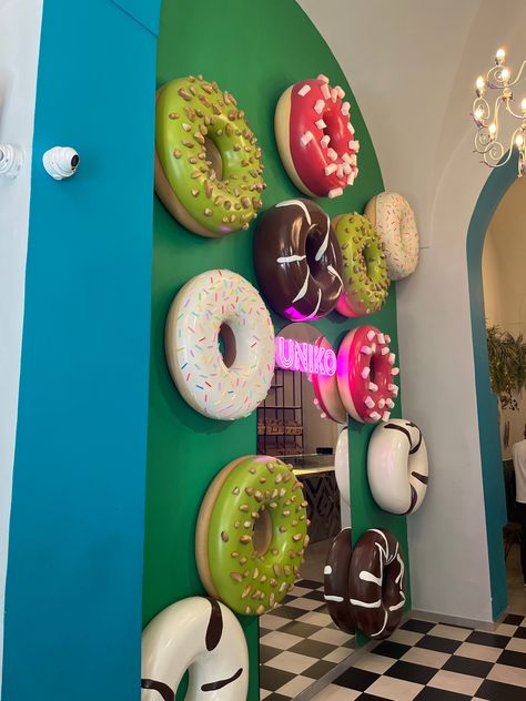 Cafe design #cafe #coffeeshop #commercialinterior Donut Cafe Interior, Quirky Cafe Ideas, Colorful Bakery Interior, Donut Shop Decor, Donut Cafe Design, Donut Store Design, Donut Furniture, Bakery Pop Up Shop Ideas, Donut Shop Design