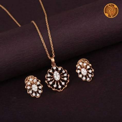 This 18kt Rose gold pendant Set is embellished with round brilliant diamonds.

Note: The given price is only for the pendant and Earrings, it does not include the Chain Rose Gold Pendant Set, Rose Gold Jewelry Set, Gold Pendant Set, Diamond Pendant Jewelry, Real Diamond Earrings, Diamond Pendent, Diamond Pendants Designs, Diamond Earrings Design, Designer Diamond Jewellery