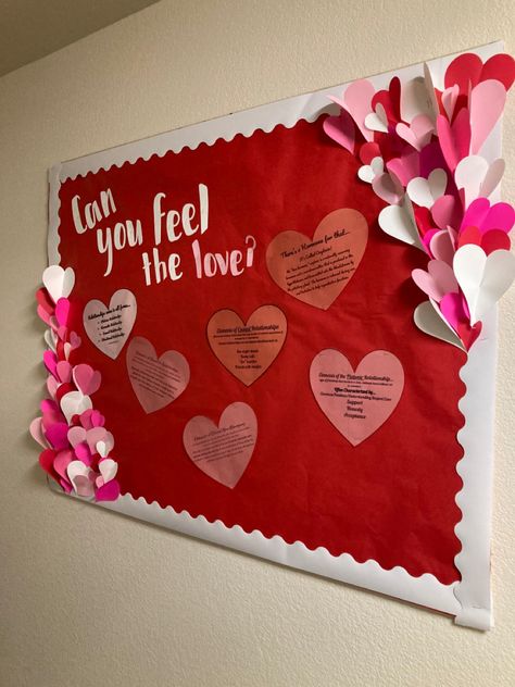 A multicolored bulletin with red, pink and white hearts on the corners. That discusses different types or relationships and relationship hormone “oxytocin”. Love Is Bulletin Board, Heart Awareness Month Bulletin Board, Valentines Theme Bulletin Board, Valentines School Board, Ra February Bulletin Boards, Valentine’s Day Ra Board, Valentines Ra Board, Valentines Day Poster Ideas, Heart Month Bulletin Board