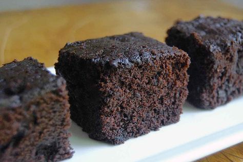 A moist, dense, cake-type brownie. Cake Brownies Recipe, Cakey Brownie Recipe, Brownie Recipe With Cocoa, Cake Like Brownies, Brownie Cake Recipe, Cocoa Powder Brownies, Cocoa Powder Recipes, Moist Brownies, Red Birthday Cakes