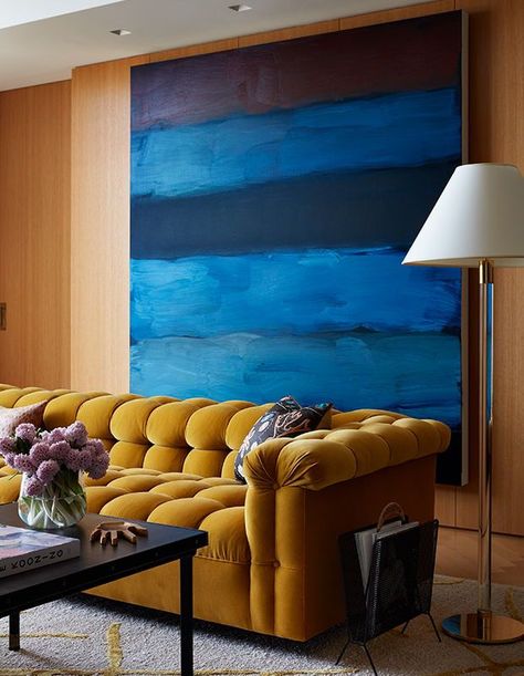 A Sean Scully painting is installed behind an Edward Wormley sofa for Dunbar in the living room. [Photographer: Stephen Kent Johnson | Source: Shawn Henderson: Interiors In Context (Monacelli, 2021)] Shawn Henderson, West Village Apartment, West Village Nyc, Cindy Sherman, Nyc Design, Hans Wegner, Greenwich Village, West Village, Colonial House