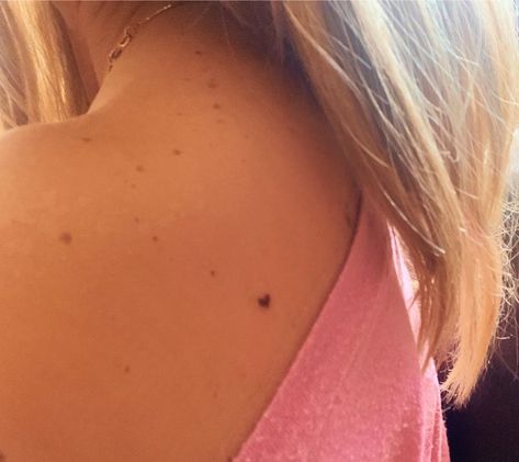 Small heart tattoo freckle dainty tattoo Tattoo On Birthmark, Heart Birthmark Aesthetic, Tiny Freckle Tattoo, Tattoos On Birthmarks, Small Brown Heart Tattoo, Heart Beauty Mark Tattoo, Heart Shaped Freckle Tattoo, Heart Tattoo Freckle, Star Mole Tattoo