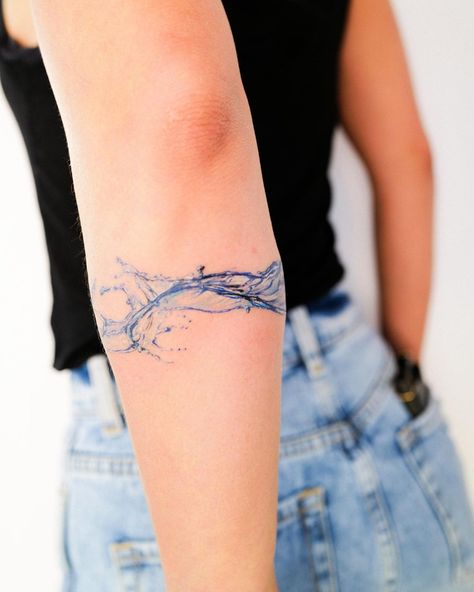 Minji seo | Water band 💦 . Booking for Los Angeles! Please contact me link in bio @guseul_tattoo *you must be 18 or older to schedule  * Design… | Instagram Ocean Wave Tattoo Minimalist, Water Band Tattoo, Wave Tattoo Color, Wave Arm Band Tattoo, Watercolor Wave Tattoo, Water Inspired Tattoo, Water Tattoo Design, Frost Tattoo, Water Tattoo Ideas