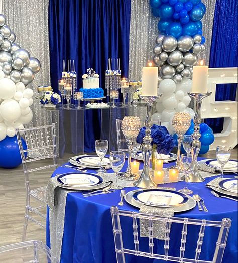 Black Royal Blue And Silver Party, Navy Blue White Silver Birthday Party, Royal Blue Gold And Silver Party Decor, Royal Blue 60th Birthday Party, Royal Blue Centerpieces Party, Royal Blue Sweet 16 Party Ideas, Sweet 16 Party Ideas Royal Blue And Silver, Banquet Color Schemes, Royal Blue And Silver Wedding Decor