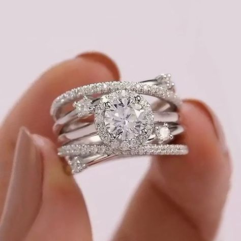 27 Stunning And Unique Black Engagement And Wedding Rings For Women | YourTango Criss Cross Diamond Ring, Diamond Birthstone Ring, Halo Wedding Set, Luxury Wedding Rings, Wedding Party Accessories, Cubic Zirconia Engagement Rings, Solitaire Rings, Colored Engagement Rings, Diamond Birthstone